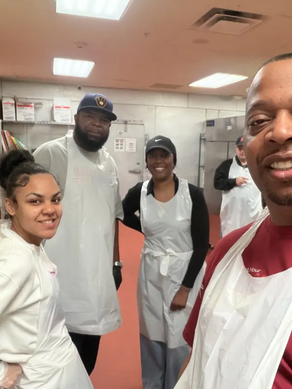 Team volunteering in the kitchen at Nashville Rescue Mission