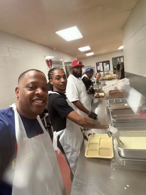 Volunteering at Nashville Rescue Mission serving food